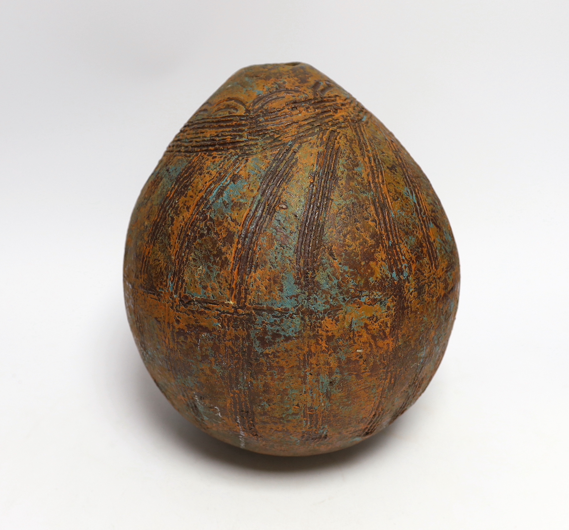 A Pre-Columbian style ovoid earthenware vase, 26cm high